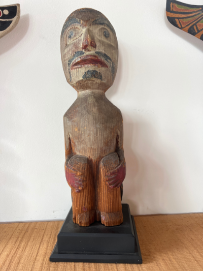 Kuakuitl crouching figure