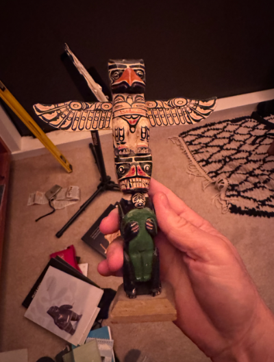 NWC totem unknown artist thunderbird with green figure