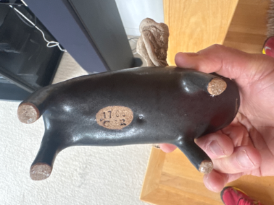 Black ceramic figure with driftwood U-shaped antlers