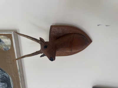 Folk art carved deer