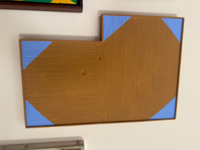 Blue and brown framed piece on ceramic Feriso joseph